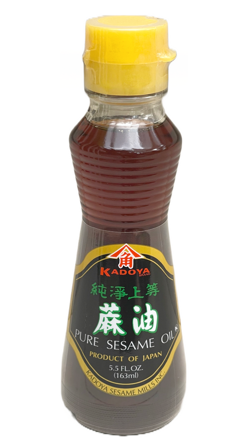 Bottle of Kadoya Pure Sesame Oil, 5.5 fl oz, imported from Japan for enhancing Asian dishes like ramen, BBQ, and poke bowls.