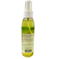 Clear spray bottle with green liquid on a white background