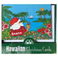 Santa in a chair looking at the tropical ocean