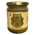 Jar of Liko Lehua Kona Coffee Butter with gold lid on a white background