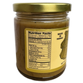 Jar of food with a gold lid and nutrition label on a white background