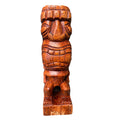 Wooden tiki statue with 'Maui' text on a white background
