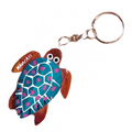 da Hawaiian Store Llavero de tortuga Honu de madera con flor pintada a mano (elegir)