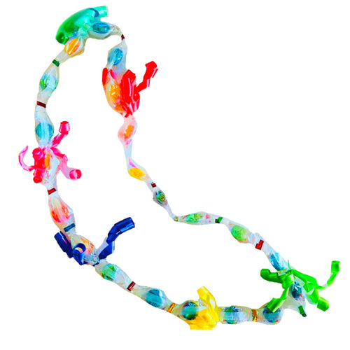 Colorful Hawaiian candy lei necklace for graduation, featuring individually wrapped candies in bright festive colors