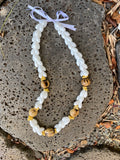 Bubble shell lei with kukui nuts