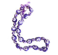 Purple Kukui Nut Lei with White flowers