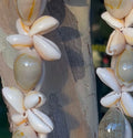 da Hawaiian Store Auténtico largo 40 pulgadas de longitud Cowrie Cowry Shell Lei