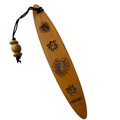 A collection of wooden bookmarks with Hawaiian inspired designs, featuring phrases and images related to Hawaii, displayed on a surface with a floral patterned book in the background.