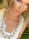 Women wearing a bubble shell lei